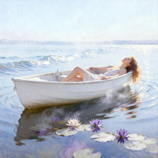 Woman lying in a small white boat on a calm body of water with lily pads.